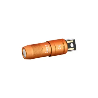 Orange imini 2 compact LED flashlight with direct USB-A charging.