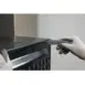Olight Opry 2 Multi-Tool Pry Bar - gloved hand using grey pry tool against metal fitting
