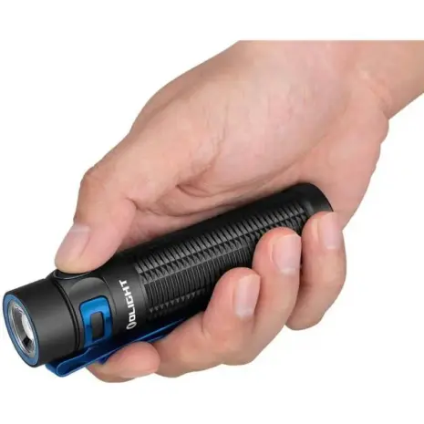 Olight Baton 3 Pro Max 2500 Lumen Flashlight - hand holding black flashlight with blue bezel and side button Olight Baton 3 Pro Max 2500 Lumen Flashlight - hand holding black flashlight with blue bezel and side button
