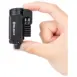 Olight Baldr S Weapon Light - black compact weapon light held between fingers